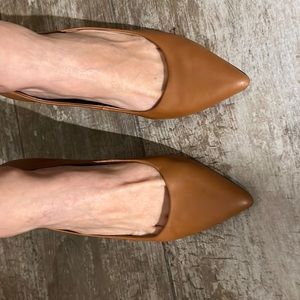 These are great heels for work. Upper Leather and very comfortable.